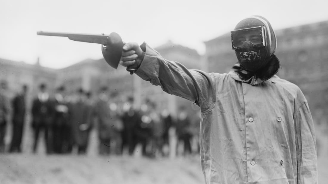 A duelist takes aim in New York City in 1909.