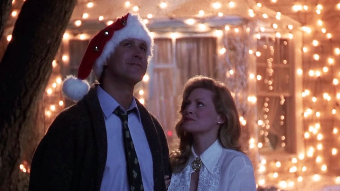 Chevy Chase and Beverly D'Angelo light up the neighborhood in Natio<em></em>nal Lampoon's Christmas Vacation (1989).