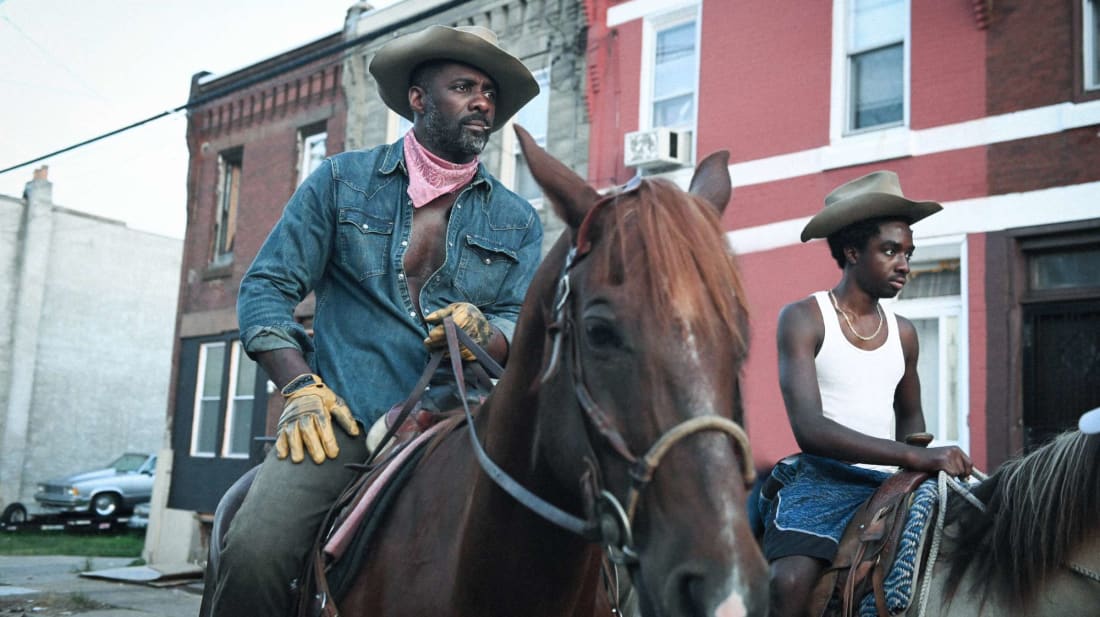 Idris Elba and Caleb McLaughlin star in Co<em></em>ncrete Cowboy (2021).