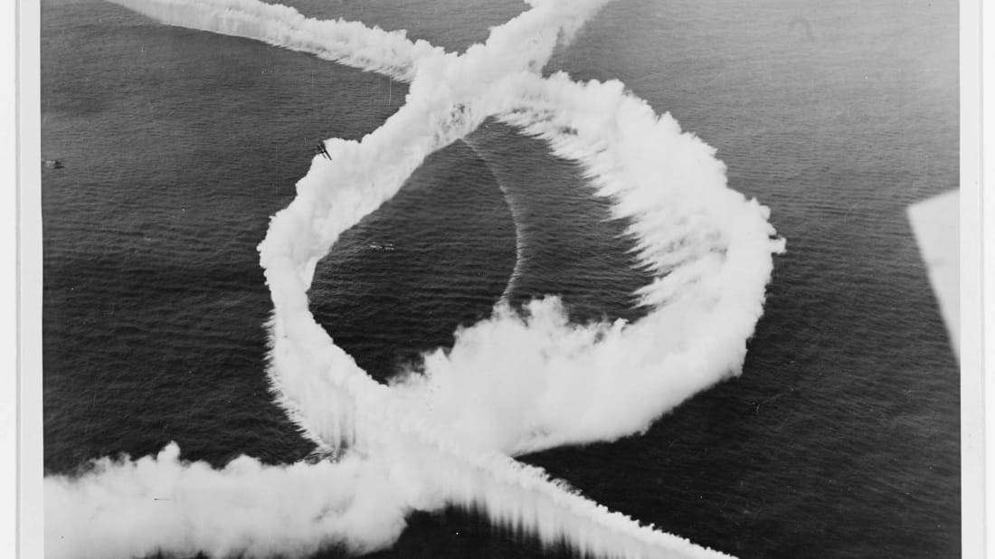 Navy planes creating smoke screens during the 1920s.