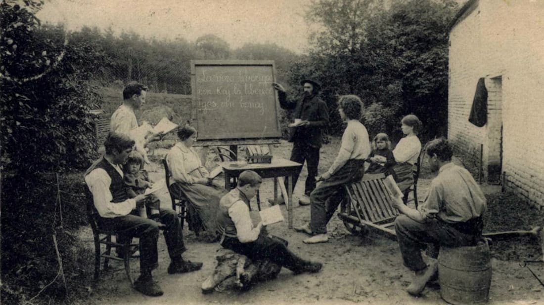 Anarchist Émile Chapelier teaches Esperanto to the members of his Libertarian commune.