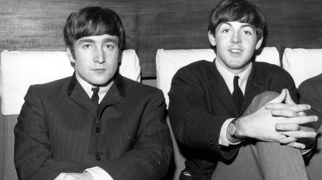 John Lennon (left) and Paul McCartney (right) from The Beatles. 