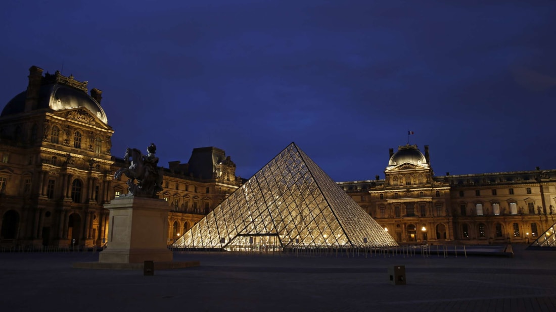 The Louvre by night.