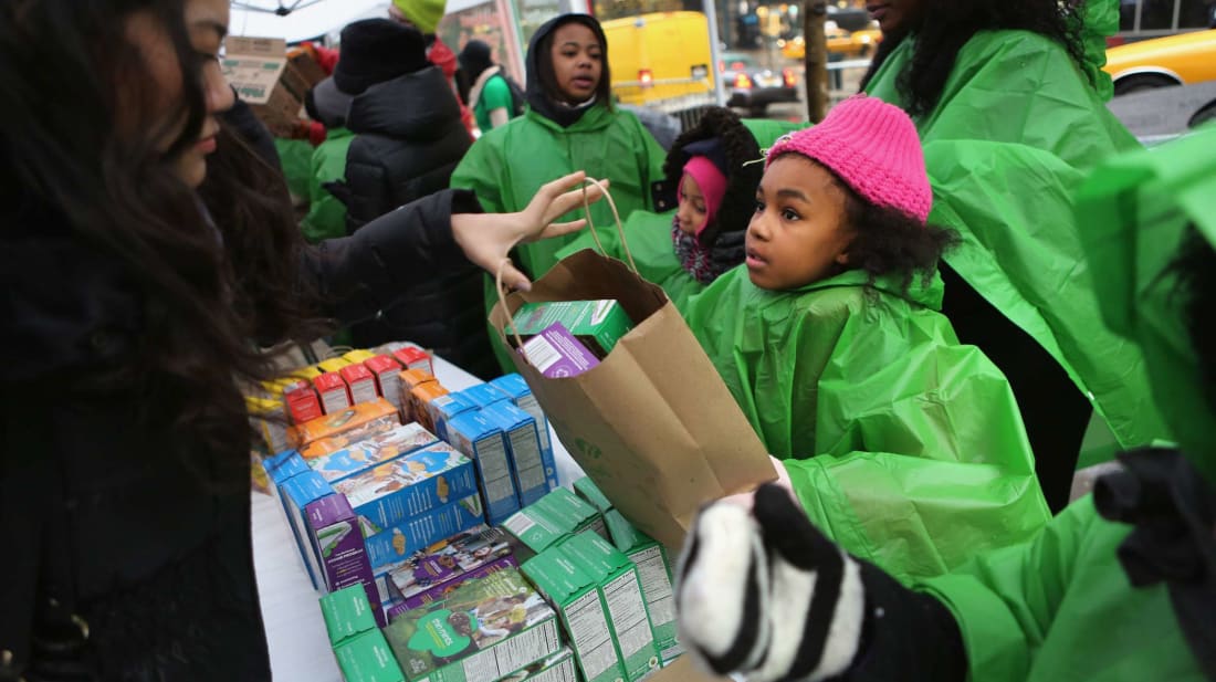 Girl Scouts sell coo<em></em>kies in New York City.