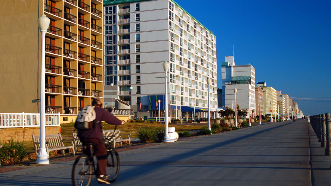 Biking along the boardwalk in Virginia Beach, Virginia.