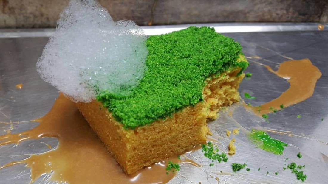 Olive oil spo<em></em>nge cake with mint crumb, sweet milk foam, and a baked apple puree.