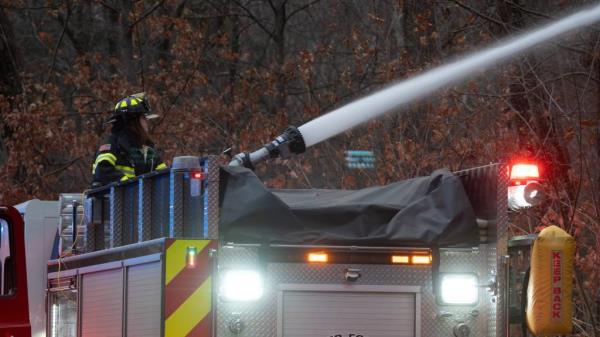 Firefighters at the scene of the blaze.