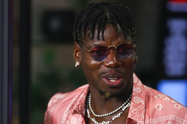 French soccer player Paul Pogba attends a game between Charlotte FC and Inter Miami at Chase Stadium 