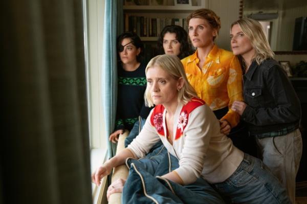 The cast of Apple TV's Bad Sisters looking out a window.