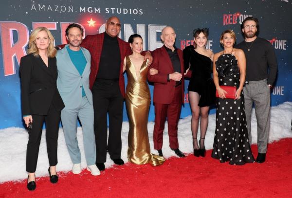 (L-R) Bo<em></em>nnie Hunt, Nick Kroll, Dwayne Johnson, Lucy Liu, J. K. Simmons, Kiernan Shipka, Mary Elizabeth Ellis and Chris Evans at the "Red One" premiere.